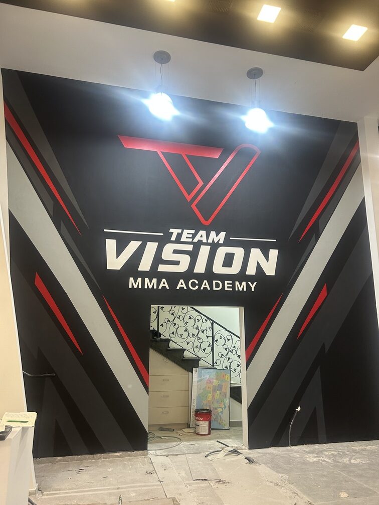 ציור קיר ממותג Team Vision MMA Academy